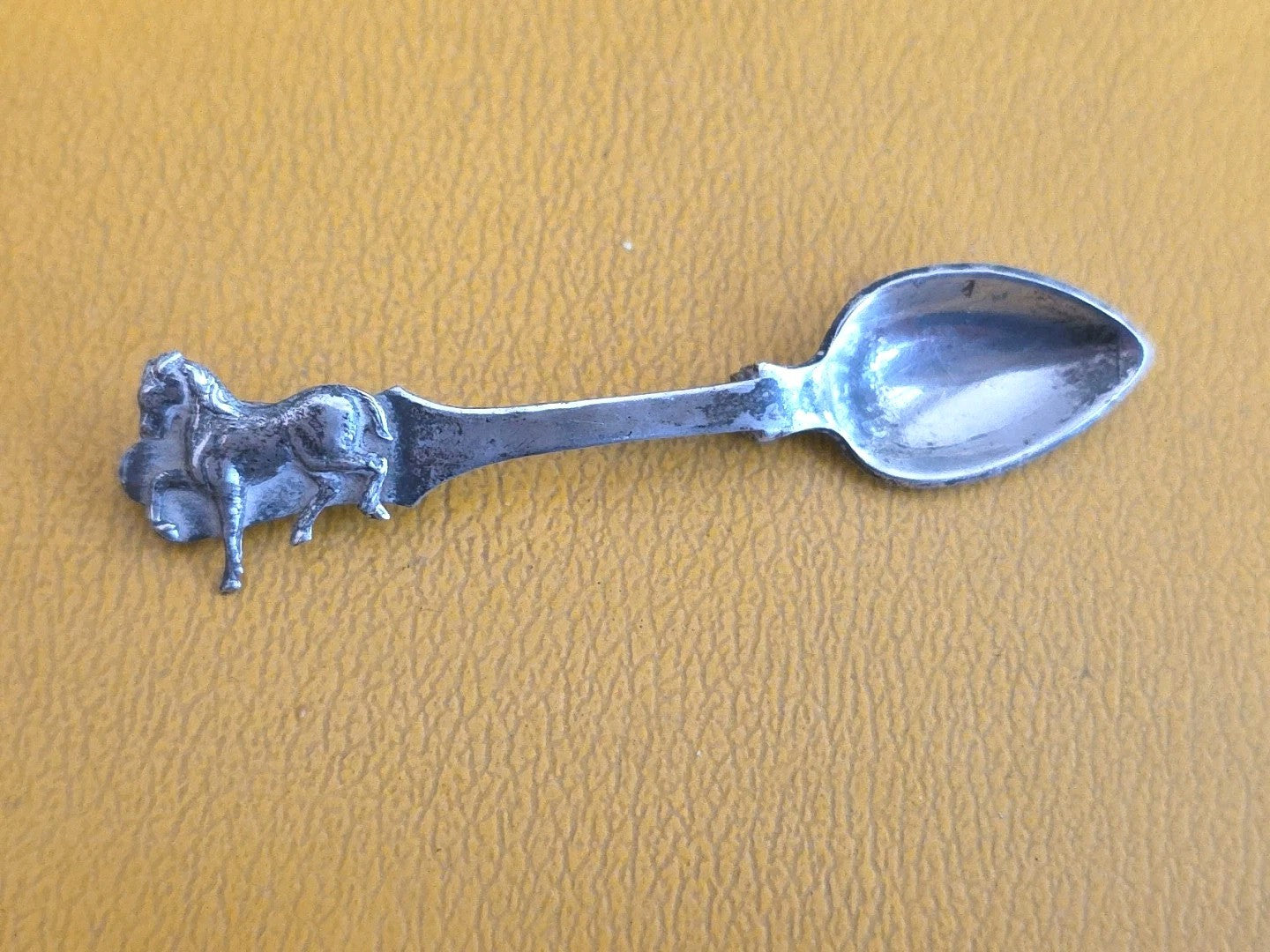 VTG STERLING SPOON AND JOCKEY RIDING HORSE BROOCH.