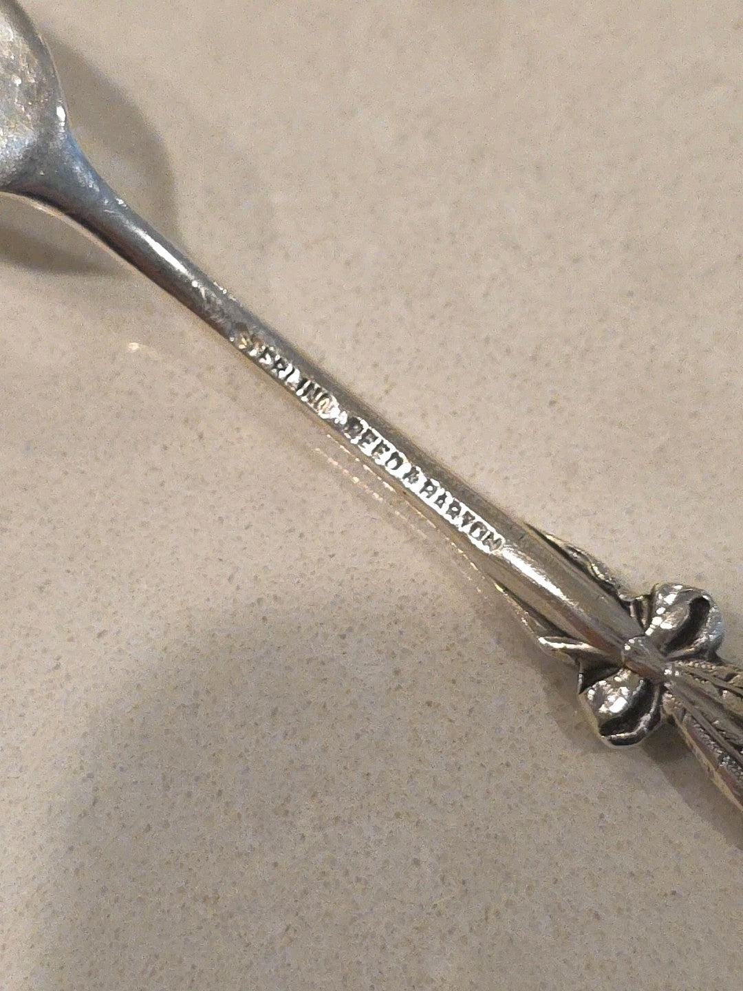 Harlequin by Reed and Barton Sterling Silver Lemon Fork with Snapdragon 5 1/2"