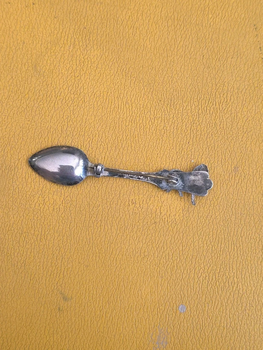 VTG STERLING SPOON AND JOCKEY RIDING HORSE BROOCH.