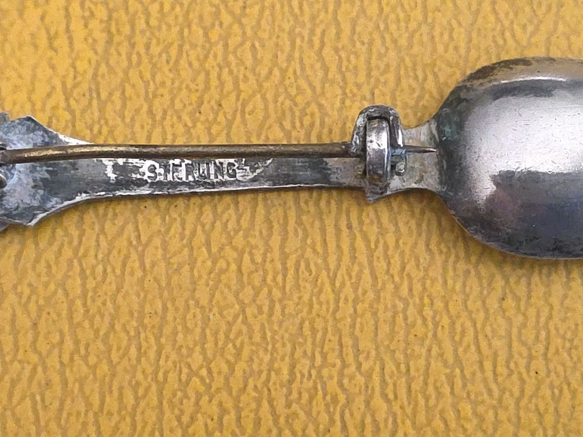 VTG STERLING SPOON AND JOCKEY RIDING HORSE BROOCH.