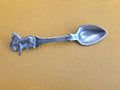 VTG STERLING SPOON AND JOCKEY RIDING HORSE BROOCH.