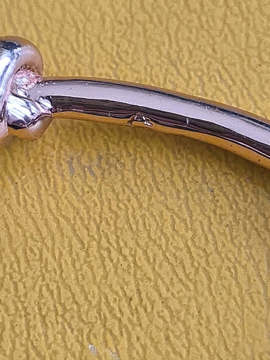CC SKYE Love Me Knot Gold Tone Bangle Bracelet