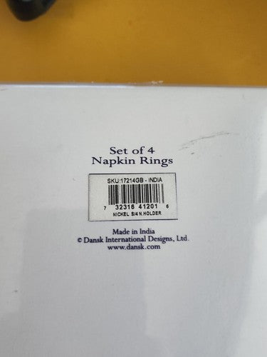 NIB Dansk International Set 4 Metal Napkin Rings Snowflake Cutout Seasonal India