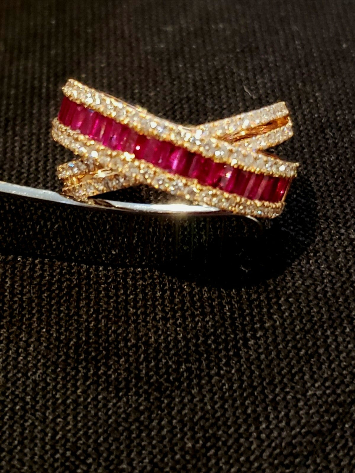 Beautiful 1.06kt  Diamonds and Rubys 14kt Ring in a Crisscross Design