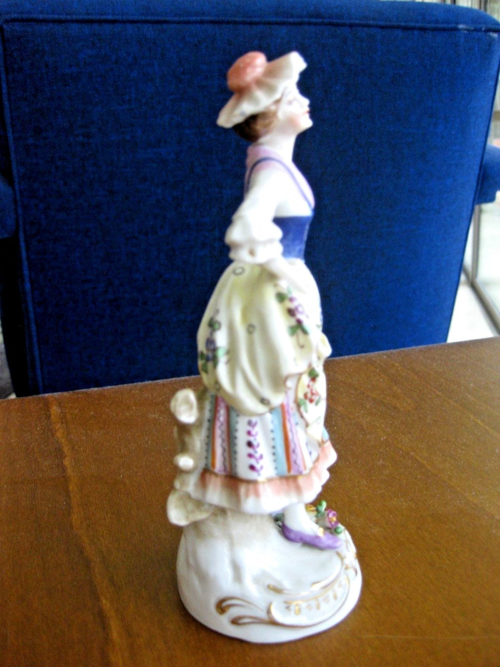 Antique German Porcelain Man Figurine Holding Bouquet of Flowers