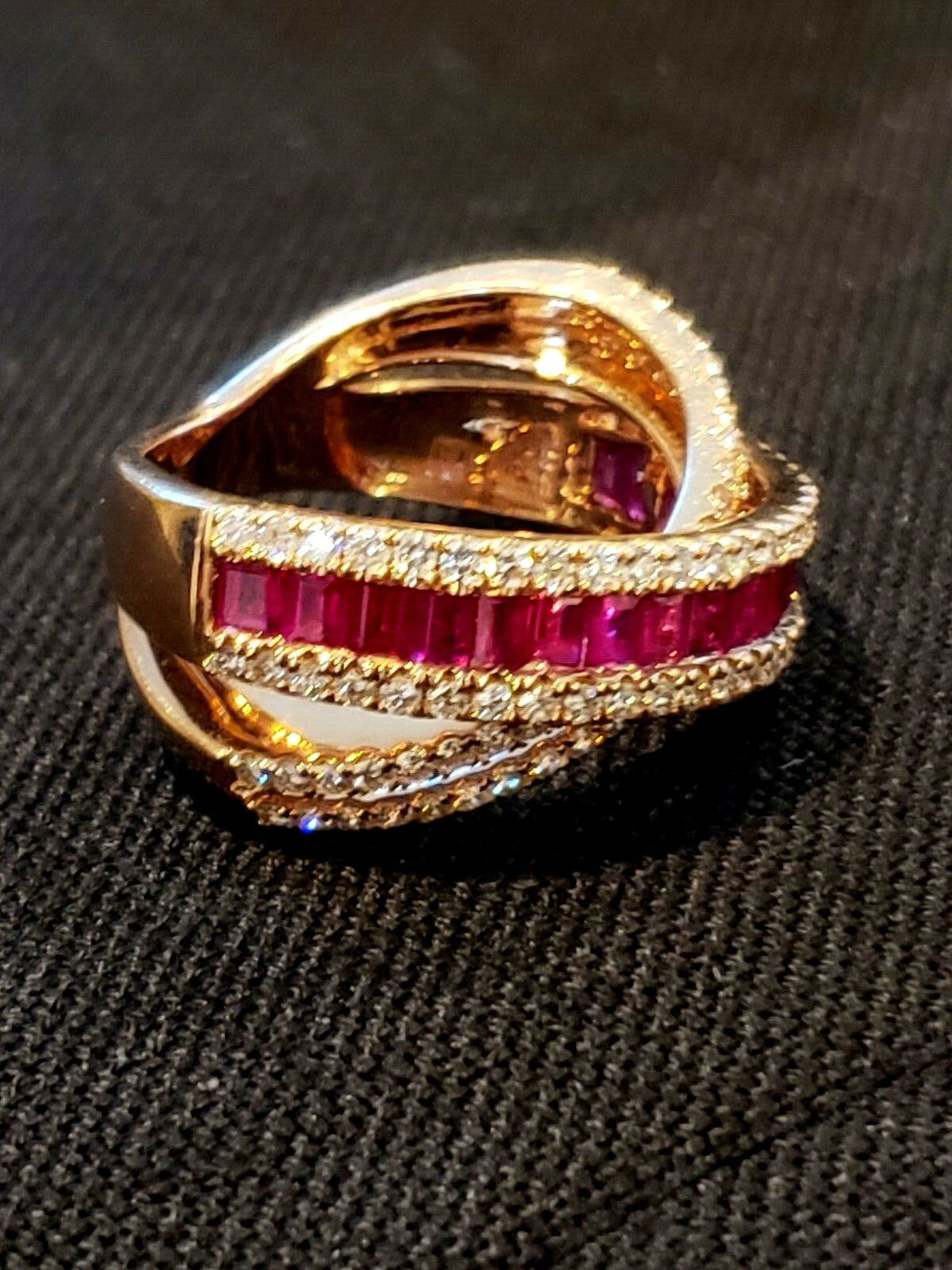 Beautiful 1.06kt  Diamonds and Rubys 14kt Ring in a Crisscross Design