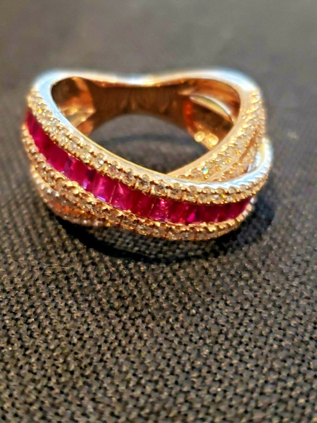 Beautiful 1.06kt  Diamonds and Rubys 14kt Ring in a Crisscross Design